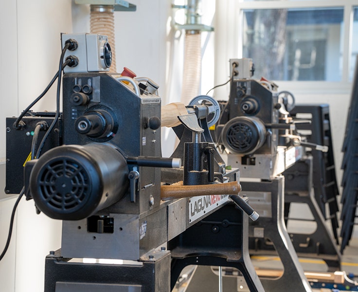 Image of one of our renovated wood workshops and some of the brand new wood lathes that are available.